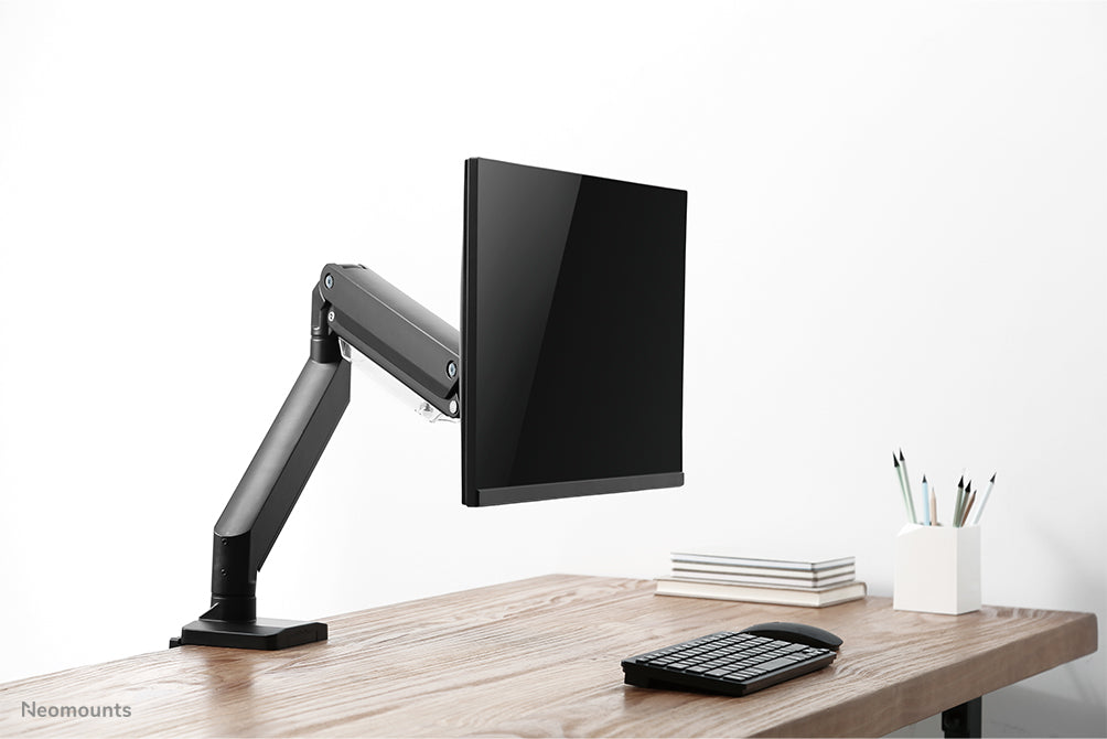 Neomounts NM-D775black is een gasgeveerde bureausteun voor flat screens t/m 32 inch (81 cm) - Zwart
