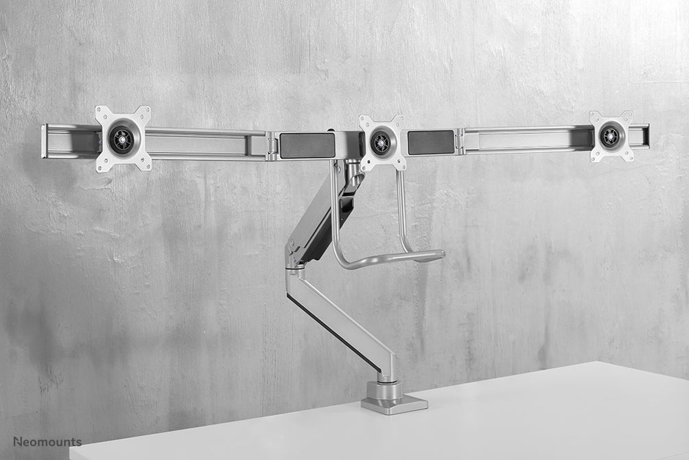Neomounts NM-D775DX3 zilver is een gasgeveerde bureausteun met crossbar en hendel voor flat screens t/m 27 inch (68,6 cm).