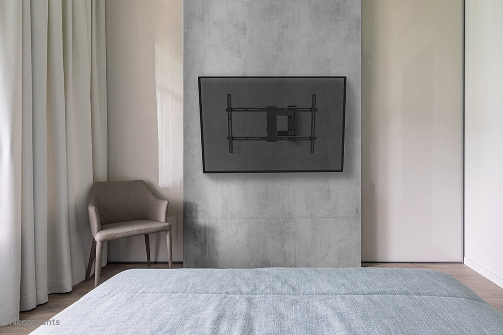 Neomounts WL40-550BL16 full motion wandsteun voor 40-65 inch schermen - Zwart